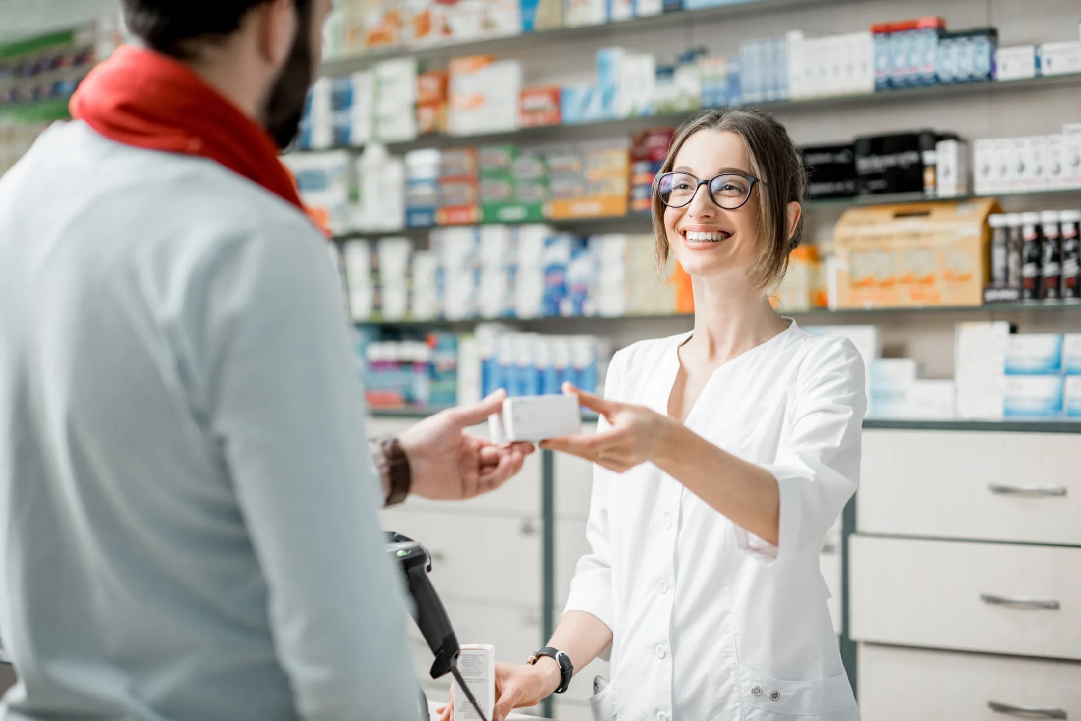 Pharmacist welcoming a patient